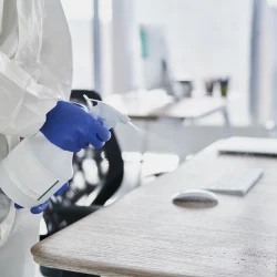 close-up-human-hands-cleaning-desk-in-the-office-2026-03-13-01-47-50-utc